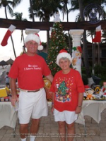 Santa delivers at the Divi to the Clown Doctors of Aruba, image # 7, The News Aruba