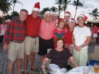 Santa delivers at the Divi to the Clown Doctors of Aruba, image # 8, The News Aruba