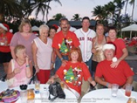 Santa delivers at the Divi to the Clown Doctors of Aruba, image # 13, The News Aruba