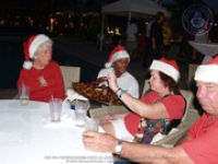 Santa delivers at the Divi to the Clown Doctors of Aruba, image # 23, The News Aruba