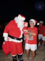 Santa delivers at the Divi to the Clown Doctors of Aruba, image # 24, The News Aruba