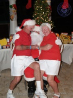 Santa delivers at the Divi to the Clown Doctors of Aruba, image # 26, The News Aruba