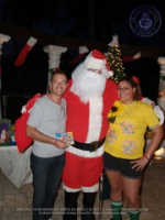 Santa delivers at the Divi to the Clown Doctors of Aruba, image # 27, The News Aruba