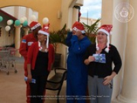 Valero and Meals on Wheels volunteers join together for a shopping spree at Ling & Sons, image # 1, The News Aruba