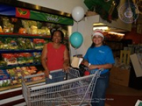 Valero and Meals on Wheels volunteers join together for a shopping spree at Ling & Sons, image # 6, The News Aruba