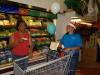 Valero and Meals on Wheels volunteers join together for a shopping spree at Ling & Sons, image # 7, The News Aruba