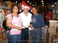 Valero and Meals on Wheels volunteers join together for a shopping spree at Ling & Sons, image # 9, The News Aruba