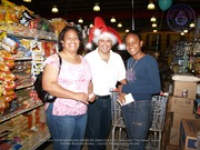 Valero and Meals on Wheels volunteers join together for a shopping spree at Ling & Sons, image # 10, The News Aruba