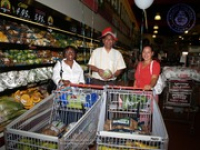 Valero and Meals on Wheels volunteers join together for a shopping spree at Ling & Sons, image # 12, The News Aruba