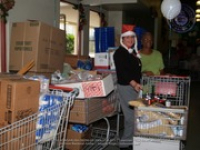 Valero and Meals on Wheels volunteers join together for a shopping spree at Ling & Sons, image # 13, The News Aruba
