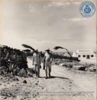 Aruban workers living in Santa Cruz walking toward main road to catch bus in time for late afternoon shift work in the Refinery (#5446, Lago , Aruba, April-May 1944), Morris, Nelson