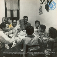The Feliciano family eating the evening meal (#5475, Lago , Aruba, April-May 1944), Morris, Nelson