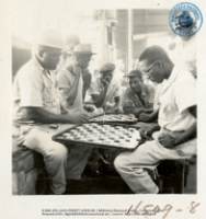 Lunchtime Checkers Game (Human Interest / People at Work, LAGO, July 1957), Lago Oil and Transport Co. Ltd.