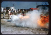 Help us describe this picture! (Fire Prevention, Lago, ca. 1965), Lago Oil and Transport Co. Ltd.