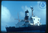 Help us describe this picture! (Ships and Crude Unloading III, Lago, ca. 1982), Lago Oil and Transport Co. Ltd.