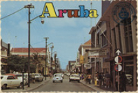 Nassaustraat' or 'Mainstreet', Aruba's busy shopping centre (Postcard, ca. 1972)