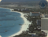 Picturesque hotels line Aruba famous Palm Beach (Postcard, ca. 1980-1986)