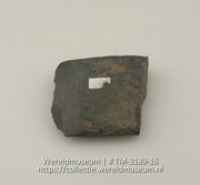 Fragment van een stenen bijl (Collectie Wereldmuseum, TM-3189-16)