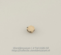 Schijfje van schelp (Collectie Wereldmuseum, TM-3189-22l)