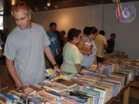 Sunday morning islanders were lined up to line their shelves, image # 7, The News Aruba