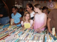 Sunday morning islanders were lined up to line their shelves, image # 13, The News Aruba
