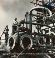 Removing Coke in Reaction Chamber on Pressure Still (#4560, Lago , Aruba, April-May 1944), Morris, Nelson