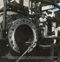 Reactor in process of being cleaned (#4590, Lago , Aruba, April-May 1944), Morris, Nelson