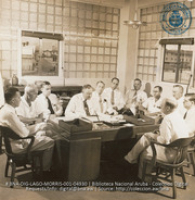 Daily morning meetings are an important phase in the operation of Aruba Refinery (#4930, Lago , Aruba, April-May 1944), Morris, Nelson
