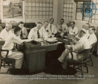 Daily morning meetings are an important phase in the operation of Aruba Refinery (#4933, Lago , Aruba, April-May 1944), Morris, Nelson