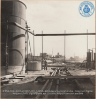 View through Acid Plant Tanks (#4958, Lago , Aruba, April-May 1944), Morris, Nelson