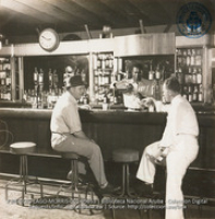 Well stocked bar in temporary ESSO Club (#5053, Lago , Aruba, April-May 1944), Morris, Nelson