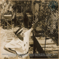 Ralph K. Watson, Process Foreman of Receiving and Shipping Department. Dabbles in hydroponics experiments in his garden. (#5139, Lago , Aruba, April-May 1944), Morris, Nelson