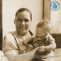 Mother of Dalmatius Navas, Lago apprentice boy, with latest addition to family (#5327, Lago , Aruba, April-May 1944), Morris, Nelson