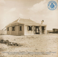Mrs. Feliciano and her house (#5422, Lago , Aruba, April-May 1944), Morris, Nelson