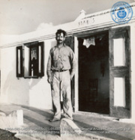 Mr. Narvas, father of Delmatius, student apprentice, shown in front of his home in the hills near Santa Cruz (#5480, Lago , Aruba, April-May 1944), Morris, Nelson