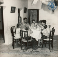 The Navas family eating the evening meal (#5486, Lago , Aruba, April-May 1944), Morris, Nelson