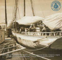 Scenes of Oranjestad harbor; showing sailors and schooners which transport fruit and fish from Venezuela and Dominican Republic (#8872, Lago , Aruba, April-May 1944), Morris, Nelson