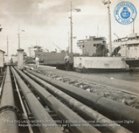View of crude unloading lines and lake tankers (#8992, Lago , Aruba, April-May 1944)