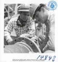 Help us describe this picture! (Human Interest / People at Work, LAGO, ca. 1955), Lago Oil and Transport Co. Ltd.