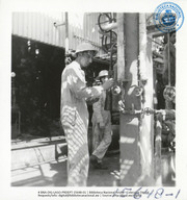 Help us describe this picture! (Human Interest / People at Work, LAGO, ca. 1956), Lago Oil and Transport Co. Ltd.