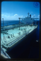 Help us describe this picture! (Ships and Crude Unloading, Lago, ca. 1982), Lago Oil and Transport Co. Ltd.