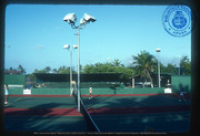 Help us describe this picture! (Tennis at the Club, Lago, ca. 1982), Lago Oil and Transport Co. Ltd.