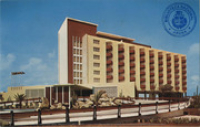 The new million dollar Aruba Caribbean Hotel and Casino; the most luxurious hotel on the finest beach in the Caribbean (Postcard, ca. 1962)