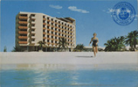 Ocean, beach, and the new Aruba Caribbean Hotel and Casino at Aruba, Netherlands Antilles, are out of this world (Postcard, ca. 1962)