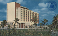 The new Aruba Caribbean Hotel and Casino at Aruba's famous Palm Beach (Postcard, ca. 1962)