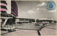 Aruba Caribbean Hotel and Casino overlooking the swimming pool (Postcard, ca. 1962)