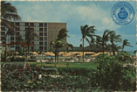 Pool terrace at Holiday Inn, Aruba, Netherlands Antilles (Postcard, ca. 1970) Flanked by beautiful tropical gardens and clean stretch of beach