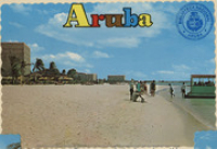 Aruba (Postcard, ca. 1972) Stretch of snow-white beach with Holiday Inn Aruba, Aruba Caribbean Hotel and Casino and Aruba Sheraton (glass bottom boat in foreground for comfortable exploration of the beautiful Caribbean Ocean)