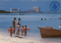 Palm Beach. Families enjoy the colorful waters of Aruba (Postcard, ca. 1976)